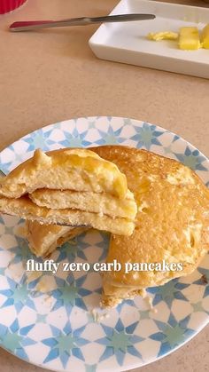 a blue and white plate with pancakes on it