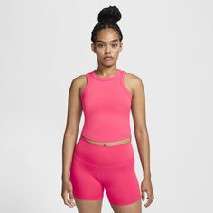 Up for a workout or down to chill, this Nike One Fitted tank top is ready for whatever you are. Midweight, peachy-soft fabric stretches with your every move and dries quickly. Slightly cropped and snug, it's ready to meet your favorite high-waisted leggings for a head-to-toe look that you can feel confident and comfortable in from your morning stroll to your evening wind-down—and at all the stops in between. Compression Athleisure Tank Top For Pilates, Compression Tank Top For Pilates, Functional Compression Tank Top For Pilates, Tank Top For Pilates With Medium Support, Compression Sleeveless Tank Top For Pilates, Medium Support Tank Top For Pilates, Spring Yoga Compression Top, Nike Sporty Sports Bra For Pilates, Nike Moisture-wicking Tops For Light Exercise