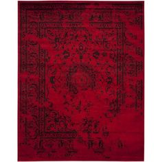 a red rug with an intricate design on the middle and bottom, it is very soft