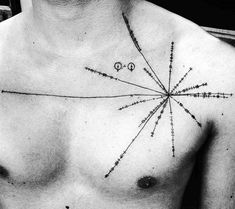 a black and white photo of a man's chest with an arrow tattoo on it