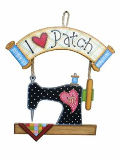 a sewing machine with the words i love patch on it