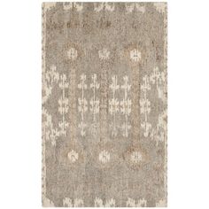 a rug with an intricate design on the front and back of it, in grey tones