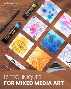 some art supplies are sitting on a table with the words 17 techniques for mixed media art