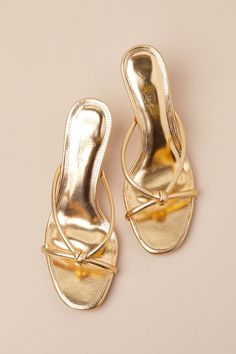 The Lulus Victoire Gold Knotted Strappy High Heel Slide Sandals are here to complete all your simply stunning date night looks! These strut-worthy sandals have a shiny faux leather construction that shapes an open-toe upper and an almond-shaped footbed. Crisscrossing straps boast a knotted detail atop the slide-on silhouette that sits atop a flirty stiletto heel. 2. 75" wrapped stiletto heel. Cushioned insole. Rubber sole has nonskid markings. Man made materials. Imported. Lulus | Victoire Gold Golden Heels Aesthetic, Date Night Looks, Heels Aesthetic, Strappy High Heels, Almond Shaped, Sandal Heels, Gold Heels, Night Looks, Stiletto Heel