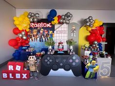 a video game themed birthday party with balloons