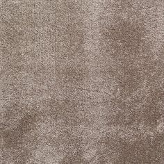 a close up view of the texture of an area rug