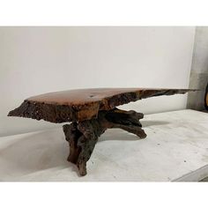 a piece of wood sitting on top of a table