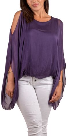 Solid Color Cold-Shoulder Blouse with Balloon Hem and Draped Sleeves. 30% Silk 70% Viscose Fits sizes XS- XL Made in Italy Silk Top With Draped Long Sleeves, Spring Silk Off-shoulder Blouse, Silk Long Sleeve Tops With Draped Sleeves, Silk Tops With Draped Long Sleeves, Off-shoulder Silk Blouse For Spring, Purple Silk Evening Top, Drapey Summer Party Top, Purple Silk Long Sleeve Tops, Long Sleeve Purple Silk Tops