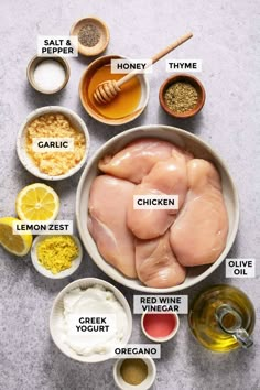 ingredients to make chicken broth laid out in bowls and labeled on the top side