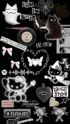 a bunch of stickers that are on a black surface with white writing and pictures