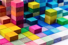 multicolored wooden blocks arranged in rows