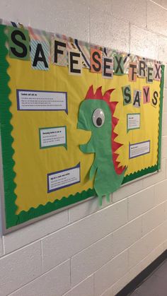 a bulletin board on the wall in a hallway