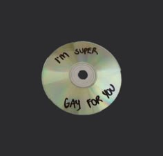 a cd with the words i'm super gay for you written on it