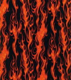 an orange and black background with red swirls