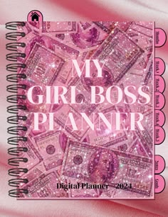 a pink notebook with the words, my girl boss planner