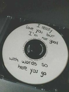 a cd with writing on it sitting in a plastic case that says, i really love you but i'm not god