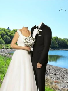 a bride and groom standing next to each other in front of a lake wearing tuxedos