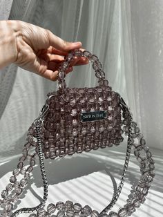 Gray Crystal Beaded Bag ✨ Introducing our gray crystal beaded bag, a symbol of elegance and sophistication. With its modern design and dazzling details, this bag adds a touch of refinement to every moment. 🌟 Width: 15 cm Height: 12 cm Depth: 6 cm Strap Length: 102 cm Not only is it stylish, but it's also functional, comfortably fitting essentials like a cardholder, lipstick, and keychain. Its eye-catching sparkle will make you stand out at special events, parties, and weddings, serving as the p Luxury Crossbody Bag, Beaded Clutch Bag, Gray Handbags, Crystal Bags, Luxury Crossbody, Vintage Shoulder Bag, Beaded Bag, Gray Top, Beaded Clutch