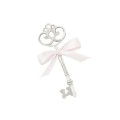 a silver key with a pink bow on it