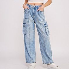 Step into the urban-chic vibe with our High Waist Baggy Denim Cargo Trousers, perfectly blending style and functionality. These jogger-style trousers are tailored to a flattering high-waist fit, designed to elongate your silhouette while providing comfort with an elastic waist. Featuring a multitude of pockets — hip, back, and side knee cargo — they offer ample storage for your essentials. The straight-leg cut maintains a sleek profile, and the combination of button and zippered closures ensures Casual Mid-rise Cargo Jeans For Spring, Trendy Baggy Mid-rise Cropped Jeans, Relaxed Fit High-waisted Cargo Jeans For Spring, Spring Relaxed Fit High-waisted Cargo Jeans, Light Wash Denim Cargo Pants In Urban Style, Light Wash Relaxed Fit Denim Cargo Pants, Urban Light Wash Denim Cargo Pants, Trendy Elevated Casual Cargo Jeans With Pockets, Trendy High Rise Baggy Cropped Jeans