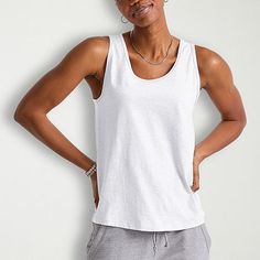 Basics that are far from basic. This cute and comfortable women's tank will get you from here to there in style with ease. Made with recycled polyester, so it's lightweight and has that soft-to-the-touch feel you know and love. A roomy fit that can be dressed up or down. Quality-wise, this tank does the most! Banded collar, armholes, and double-needle stitching on the hem for a fit that won't quit. Grab a few in our basic colors and beef up your staples with these tank tops for women by Hanes or Relaxed Fit Tank Vest Top, Casual Tank Strap Tops For Loungewear, Basic Everyday Tops With Tank Straps, White Casual Tank Top For Loungewear, Casual White Tank Top For Loungewear, Everyday Racerback Tops For Summer, Racerback Tops For Everyday Summer Wear, Cotton Scoop Neck Tank Top For Gym, Solid Everyday Tank Tops