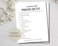 wedding photo hunt printable checklist with flowers on the side and white wood background