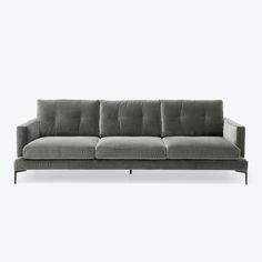 an image of a grey couch on a white background