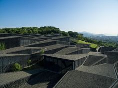 an aerial view of a building made out of rocks