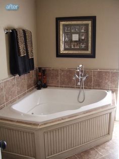 a bathroom with a large jacuzzi tub in it