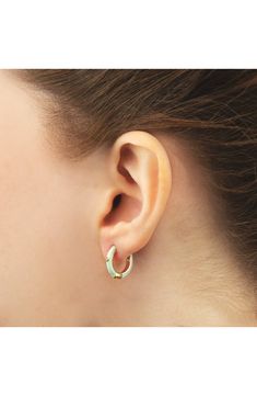 Easy-to-wear hoop earrings will add significant polish to even your most casual ensembles. 1/2" drop; 1/8" width Hinge with snap-post closure Sterling silver with goldtone plate/cubic zirconia Imported Enamel Ear Wire Jewelry, Hypoallergenic Enamel Jewelry For Everyday, Yellow Gold Enamel Hoop Earrings For Pierced Ears, Enamel Huggie Hoop Earrings For Pierced Ears, Everyday Enamel Hoop Earrings, Hypoallergenic Green Huggie Earrings, Hoop Huggie Earrings In Enamel, Enamel Huggie Hoop Earrings, Small Hoop Enamel Earrings