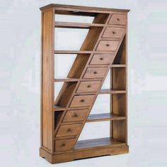 an open bookcase with drawers and a ladder on the bottom shelf is made out of wood