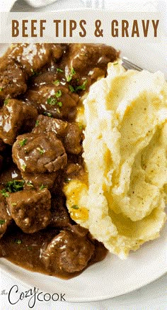 beef tips and gravy on a plate with mashed potatoes