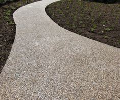 an empty path in the middle of a park