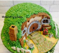 a cake made to look like a hobbot house