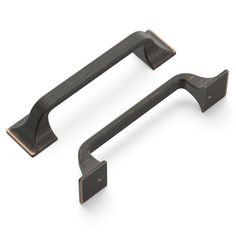 an image of two metal handles on a white background