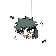 an anime character hanging from a string