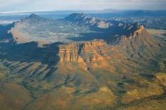 an aerial view of the mountains and valleys