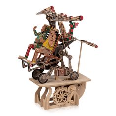 a sculpture made out of wooden toys on top of a table