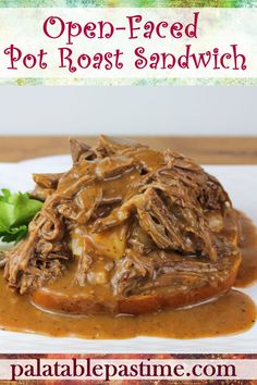 an open faced pot roast sandwich with gravy on top