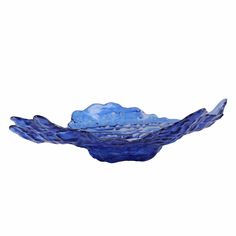 a blue bowl with waves in it on a white background, that has been drawn by hand