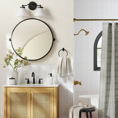 a bathroom with a sink, mirror and shower curtain in it's center area