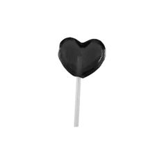 a black heart shaped lollipop on a stick