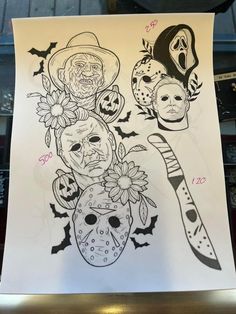 a sheet of paper that has some drawings on it with skulls and flowers in the middle