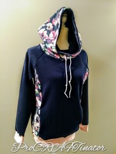 a woman's hoodie with flowers on it