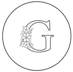 the letter g with flowers on it is shown in black and white, as well as an