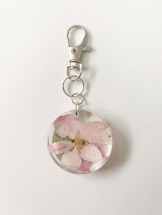 Large circle resin keychain with pink flower Pink Flower Key Chain, Resin Keychain, Pink Flower, Dried Flowers, Lanyard, Keychains, Pink Flowers, Display Homes, Ships