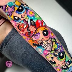 a person with a colorful tattoo on their arm