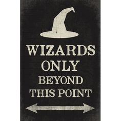 a sign that says wizards only beyond this point with an arrow pointing to the right