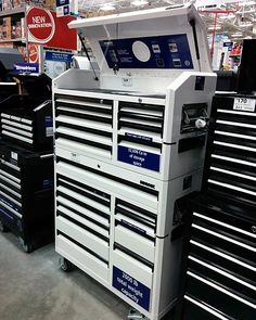 a large tool cabinet with many drawers on display