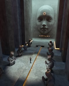 an image of a man standing in front of a group of statues with faces on them